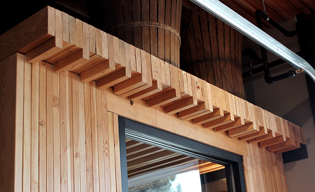 Nail-Laminated Timber frames the entryway at the Crux Fermentation Project